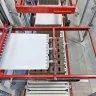 Masina Automata Pentru Legarea Orizontala A Paletilor-Masini de legat integrate in linia de productie