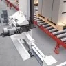 Masina Automata Pentru Legarea Verticala A Paletilor-Masini de legat integrate in linia de productie